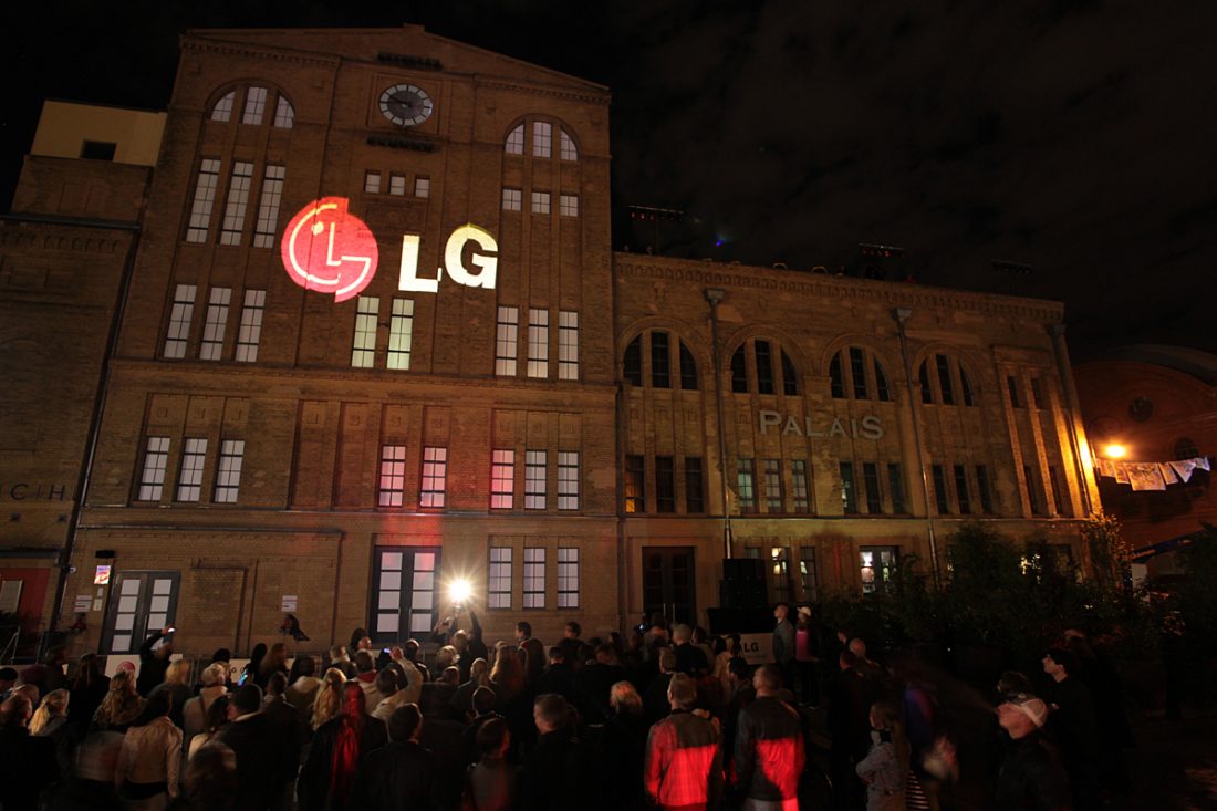 The logo of LG Electronics projected onto the façade in Kulturbrauerei to highlight LG’s upcoming smartphone, the LG Optimus One.