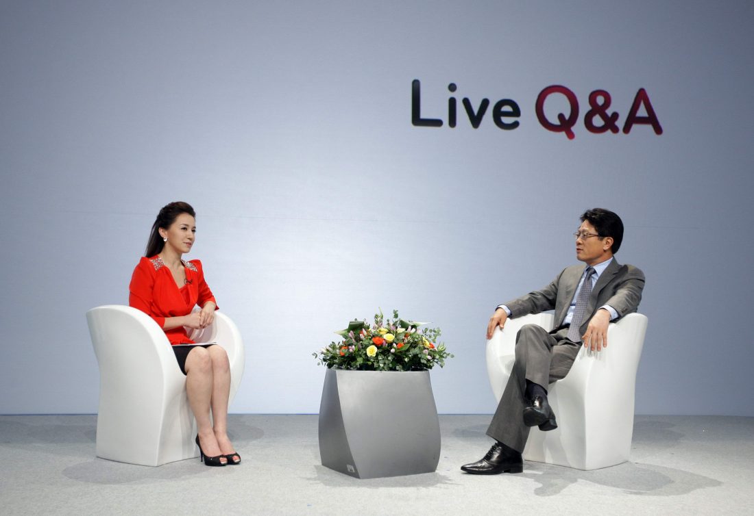 Dr. Skott Ahn answers questions from the host on the LG Optimus stage.