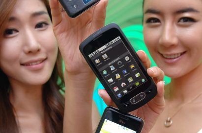 Two models hold up two variants of the LG Optimus Chic and one of the LG Optimus One in a vertical pattern.