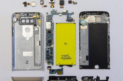 All modular components of LG G5 laid out on flat surface