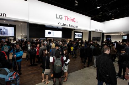 Many visitors discussing LG’s products while taking a look around the LG ThinQ AI zone at LG’s CES booth