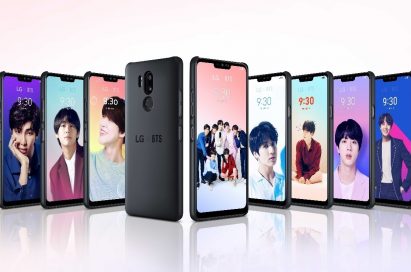 A string of the LG G7 ThinQ smartphones attached to the BTS Smart Case display images of BTS members.