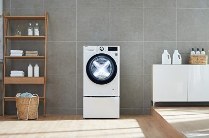 LG washing machine with AI DD™ in a laundry room